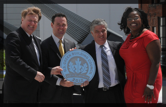 Senator Fontana, pictured with County Executive Rich Fitzgerald and Mayor Luke Ravenstahl accepts a plaque from Kimberly Lewis of the U.S. Green Building Council.