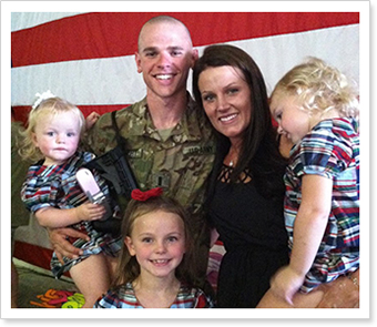 Lt. Schubert with his family upon returning home.