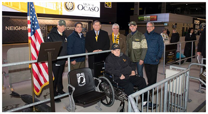 In the photo from left to right are: Steelers Owner Art Rooney II, Senate Democratic Leader Jay Costa, Senator Randy Vulakovich, Senator Fontana, former Steeler and Vietnam Veteran Rocky Bleier and Jim Sacco, Steelers VP of Stadium Operations and Management, joining Al Murtha, a World War II POW who served in the Army Air Corps. 