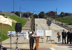 October 7, 2016: State Senator Wayne D. Fontana today served as master of ribbon cutting ceremonies as officials and community leaders marked the opening of the new connector streets in the city’s lower Hill District.