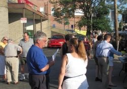 July 25, 2012: Senator Fontana speaks with a resident at the Communities Against Crime initiative