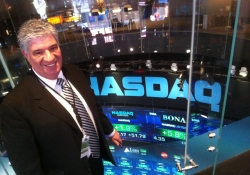 December 2011: Senator Wayne D. Fontana stands on the NASDAQ floor while in New York attending PA Society.